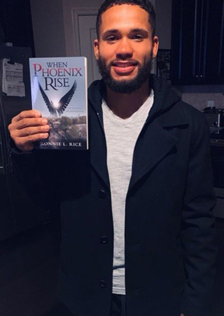 Man Holding Book