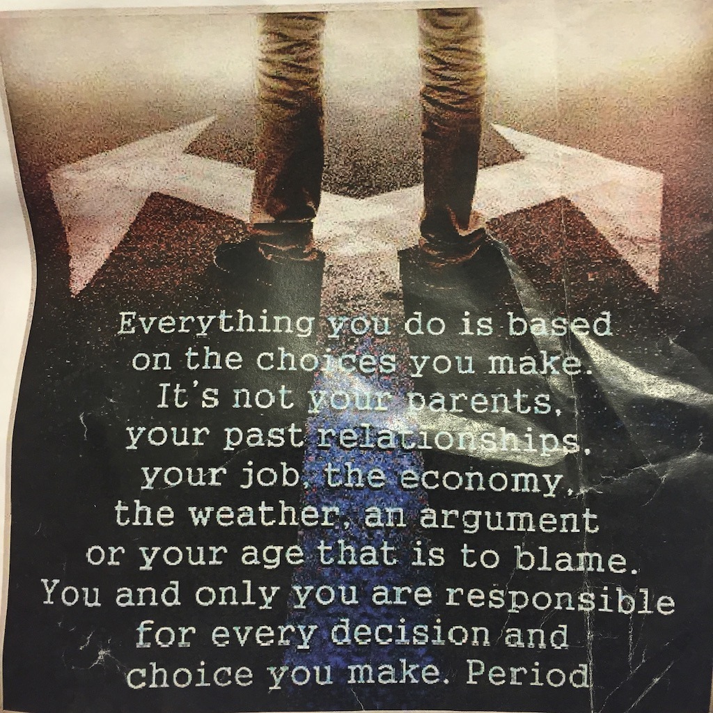Text about personal responsibility overlays an image of a person standing at a crossroads